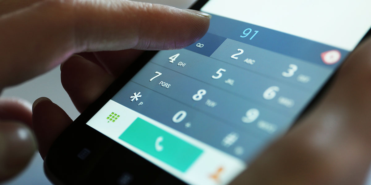 Non-Geographic Numbers 1 typing-a-phone-number-on-mobile